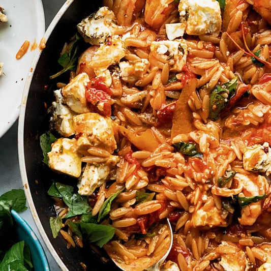 Tomaten-orzo met spinazie
